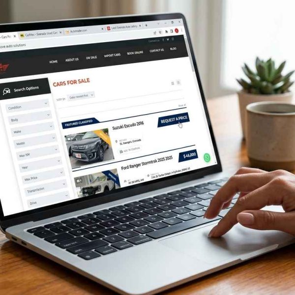 Browsing car dealership websites to research vehicles in Grenada.